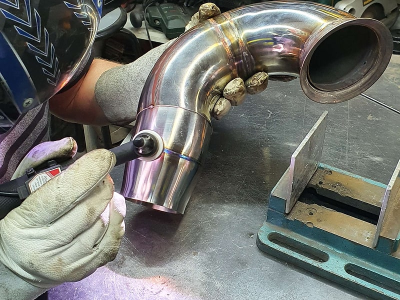 TIG welding a custom stainless component at SNIPER Racing