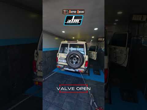 Land Cruiser 76 in the workshop during its SNIPER Racing valved exhaust sound demonstration